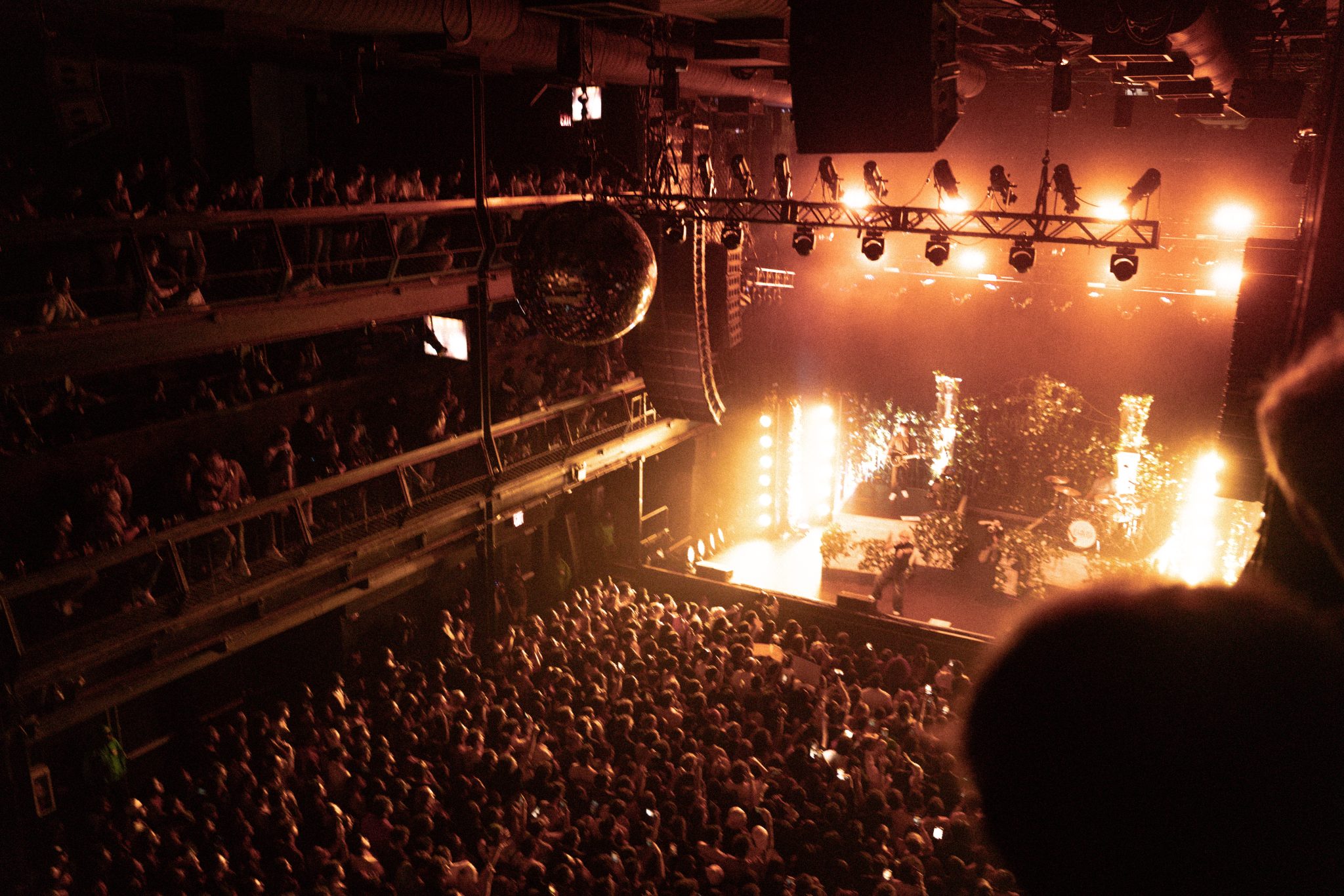 Performers connecting with a packed live audience